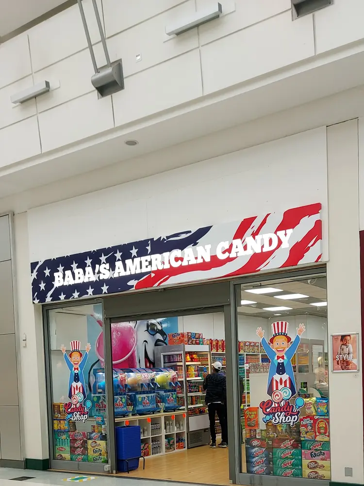 BABA's American Candy shopfront seen from the shopping centre walkway